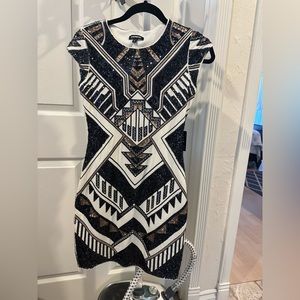 Form fitting sequence Aztec dress